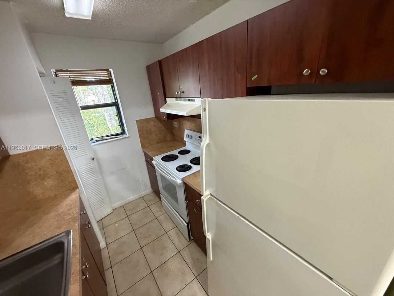 6975 Nw 179th St #205 - Photo 2 of 6