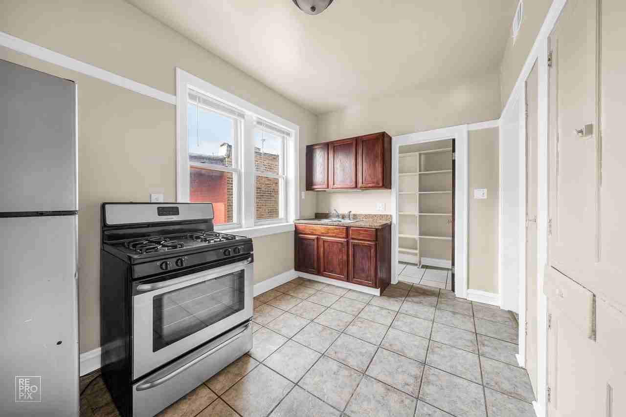 7751 S Saginaw Ave Apt 2 #2 - Photo 5 of 14