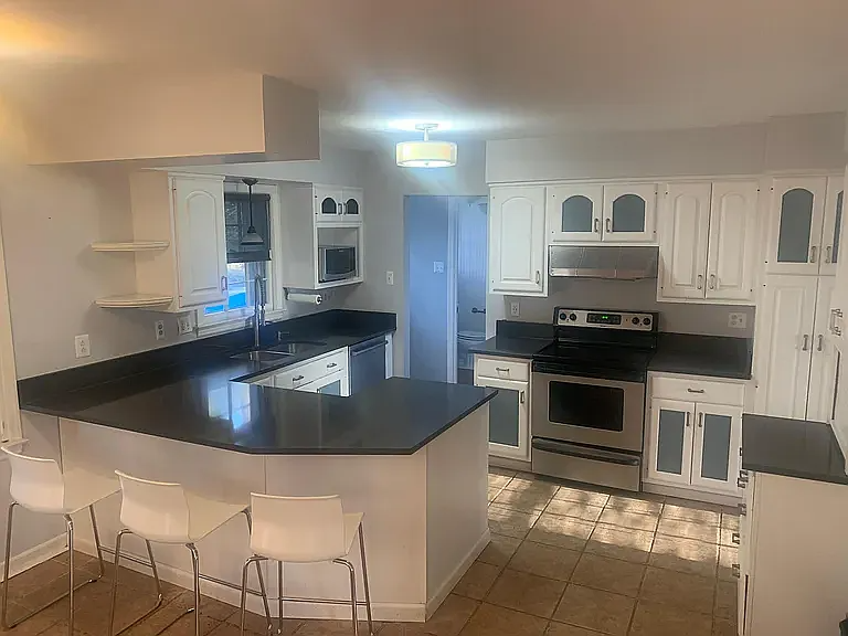 8310 Chivalry Rd - Photo 4 of 14