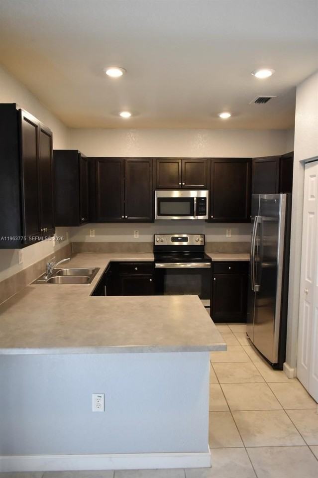 3392 Se 1st St - Photo 3 of 13