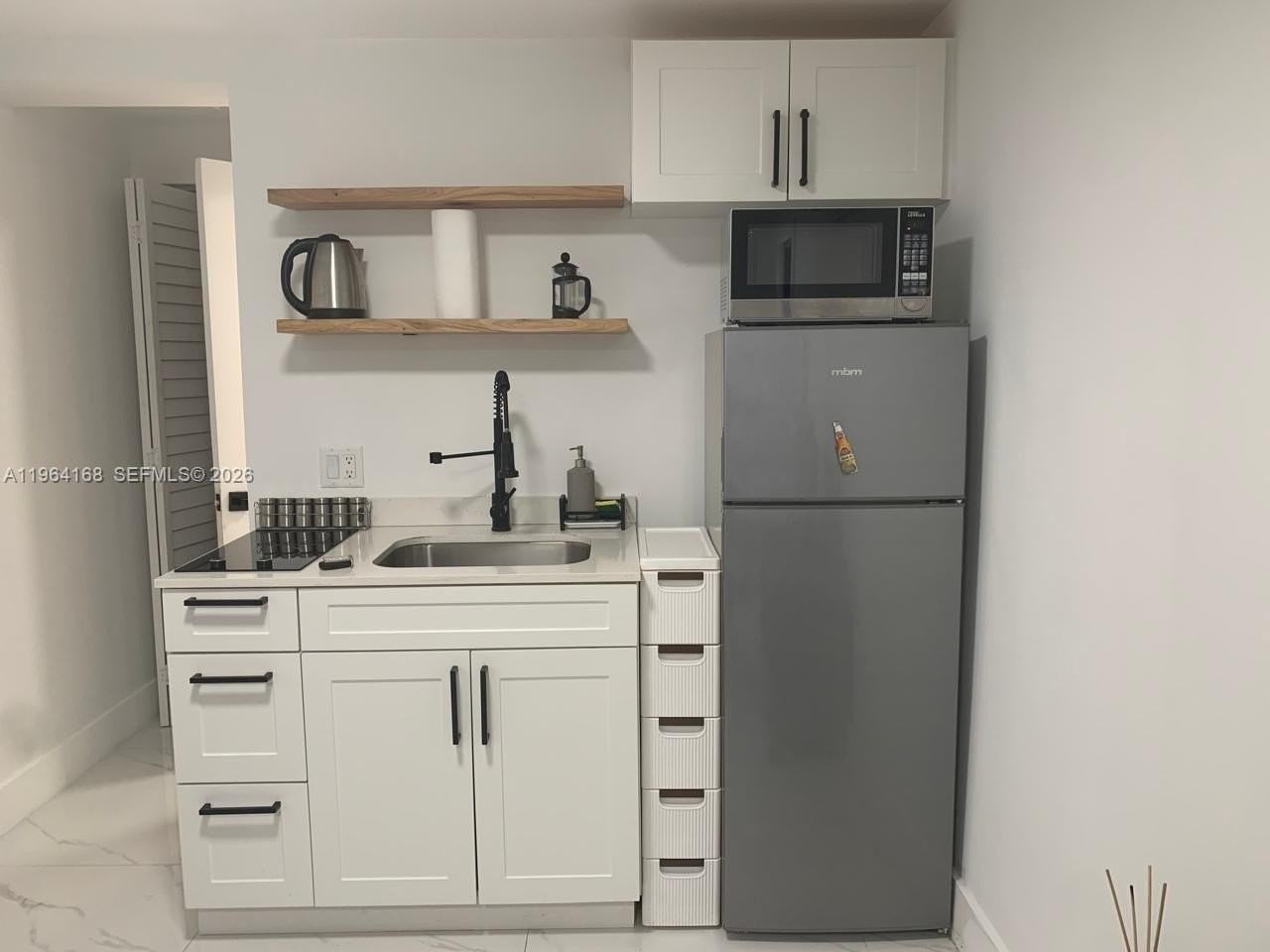 610 Nw 111th St #1 - Photo 7 of 9