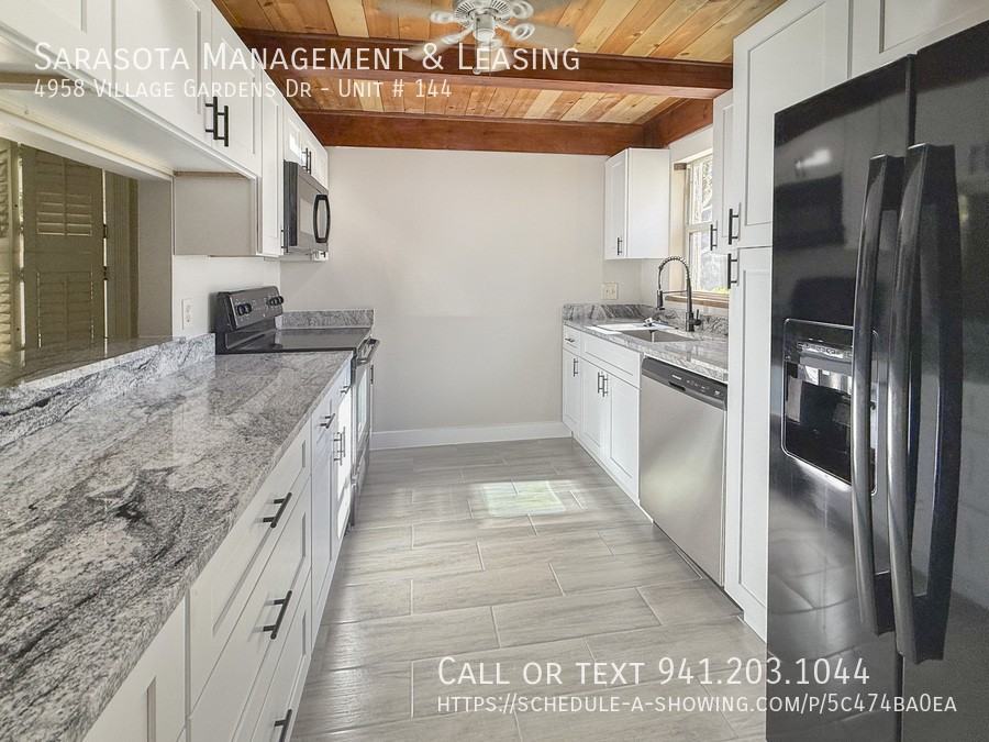4958 Village Gardens Dr #144 - Photo 3 of 21