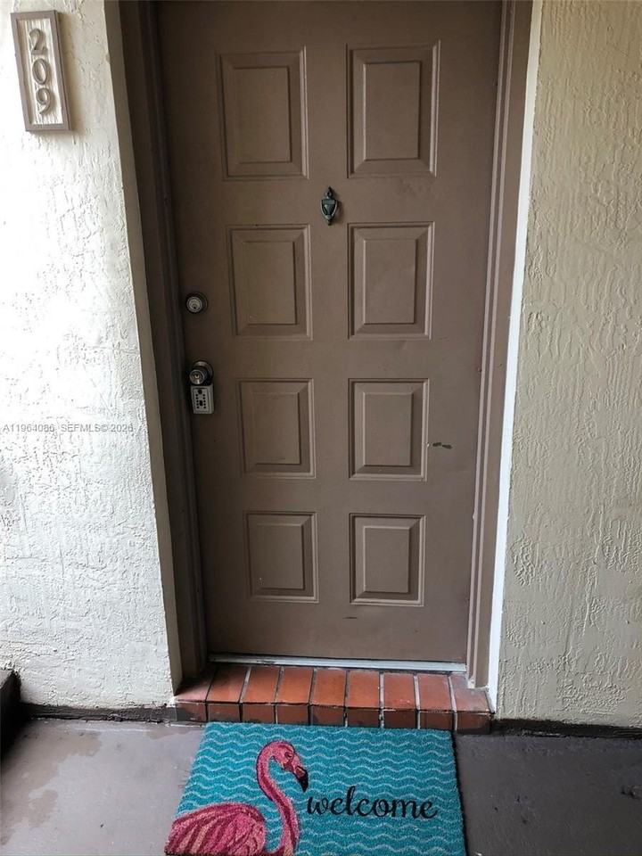 7130 Nw 179th St #209 - Photo 2 of 16