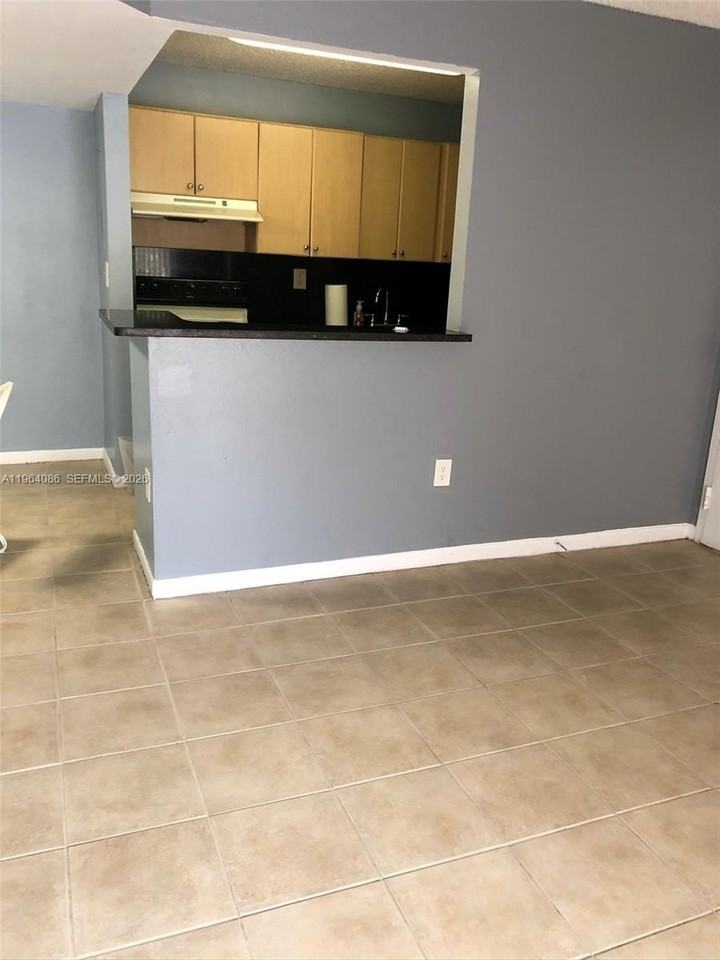 7130 Nw 179th St #209 - Photo 5 of 16