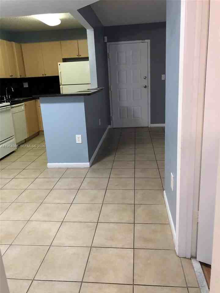 7130 Nw 179th St #209 - Photo 6 of 16