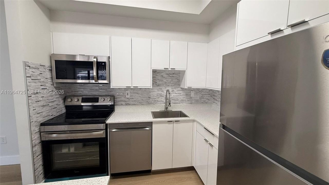 9705 Hammocks Blvd #201 - Photo 2 of 14