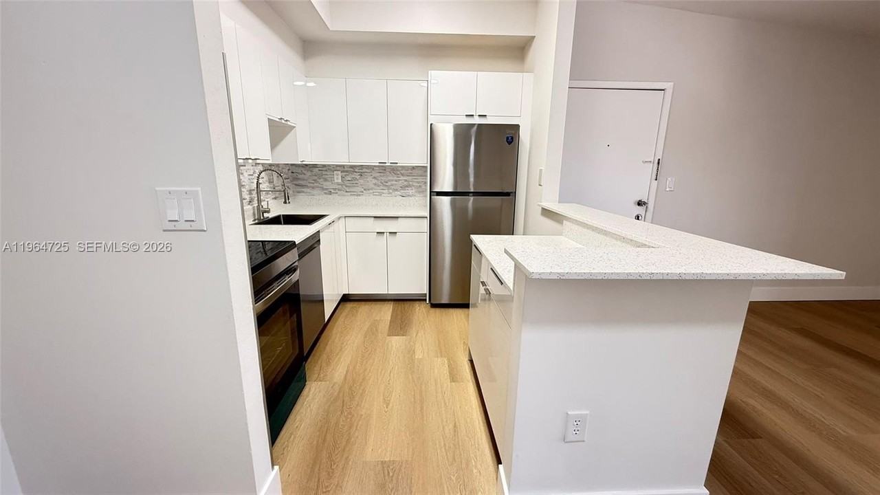 9705 Hammocks Blvd #201 - Photo 3 of 14