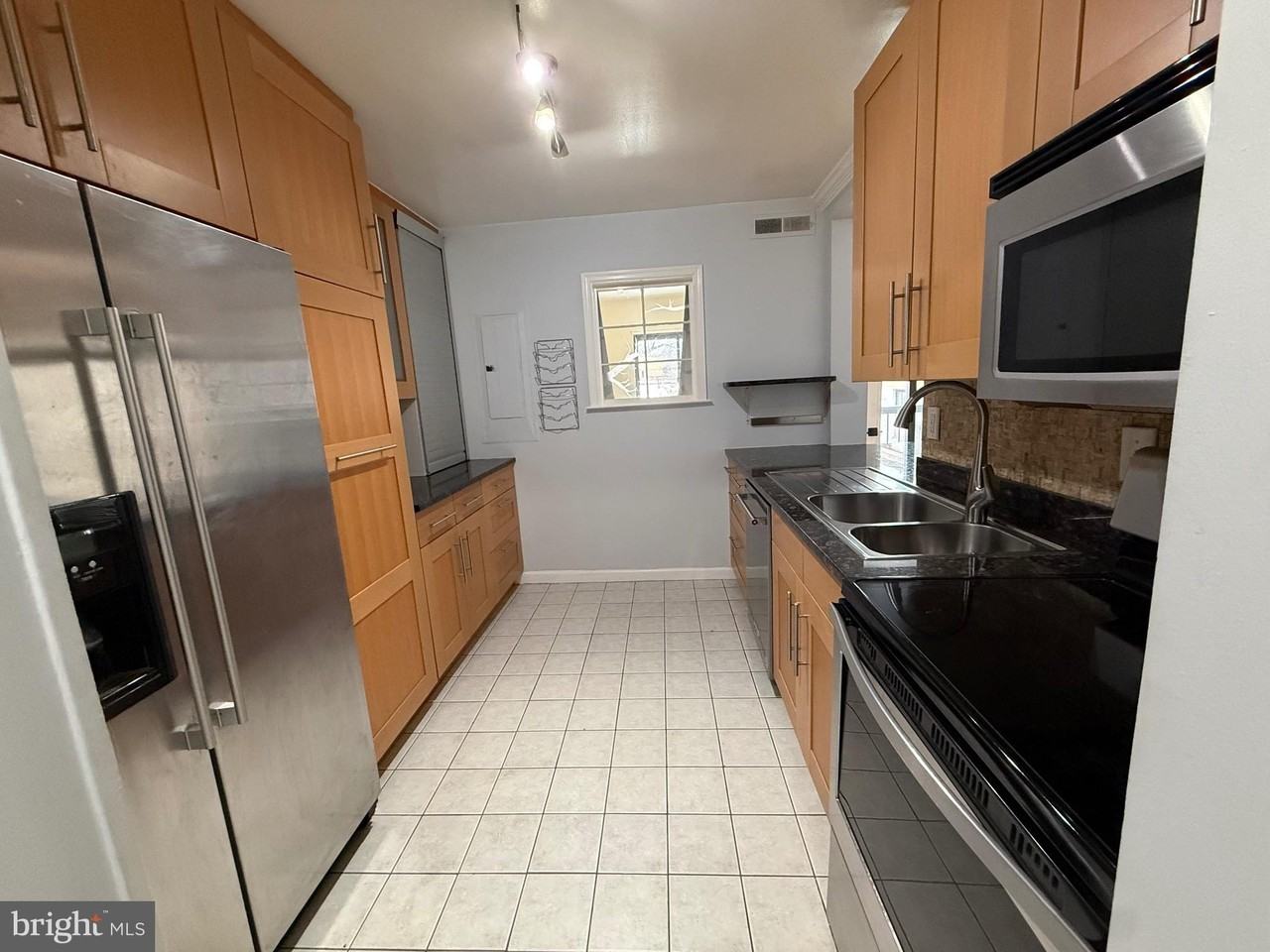 12702 Veirs Mill Rd Apt 51-301 #51-301 - Photo 3 of 26