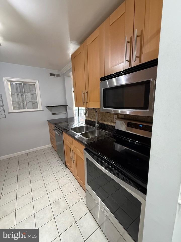 12702 Veirs Mill Rd Apt 51-301 #51-301 - Photo 7 of 26