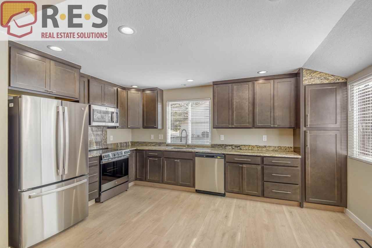 7731 S Spruce St - Photo 2 of 22