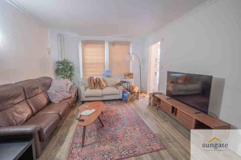 213 E 33rd St - Photo 2 of 26