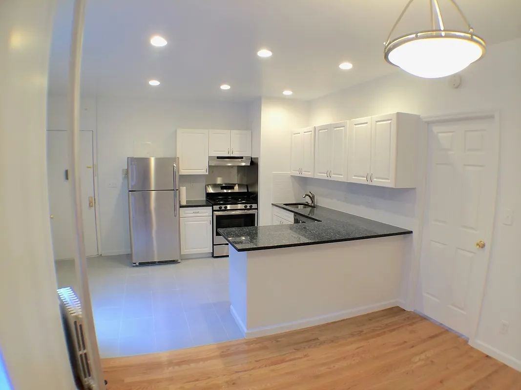 7025 Yellowstone Blvd - Photo 2 of 7