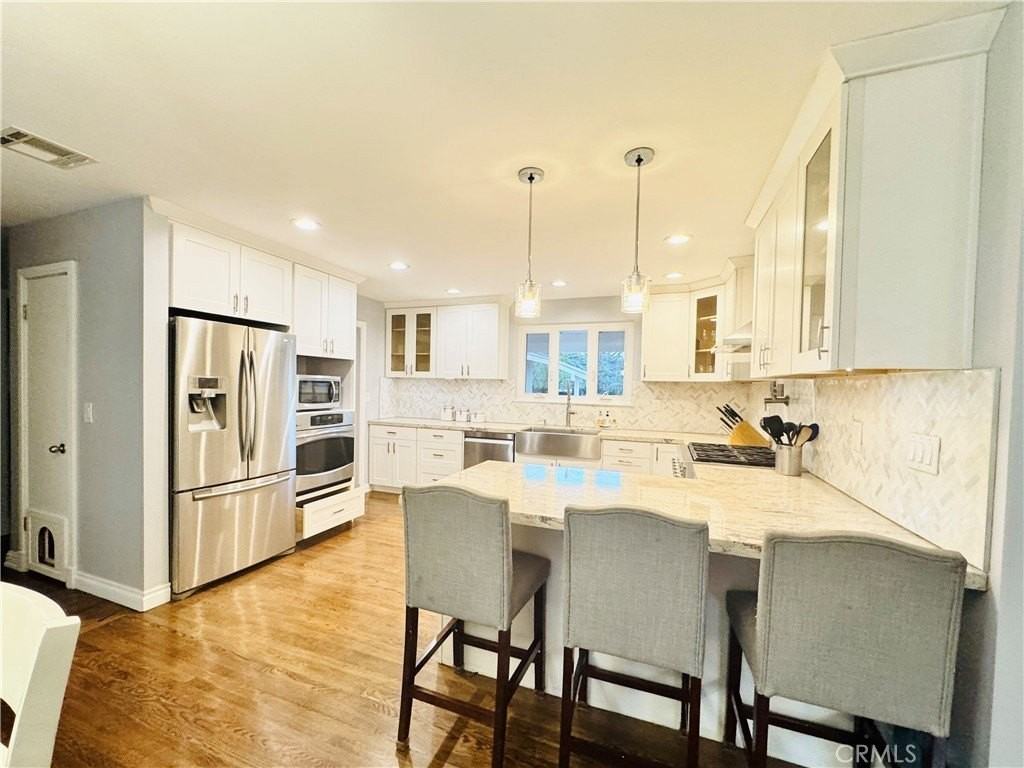 11905 Paso Robles Ave - Photo 4 of 44