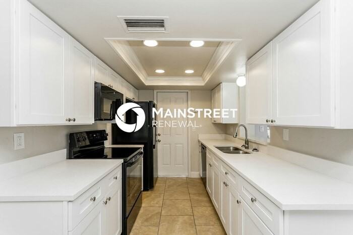 7625 Ilex Dr - Photo 4 of 16