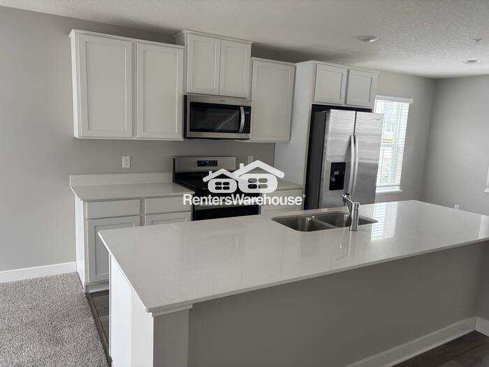 12572 Guadalcanal Cir Ne #F - Photo 4 of 21