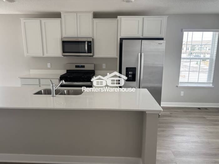 12572 Guadalcanal Cir Ne #F - Photo 5 of 21