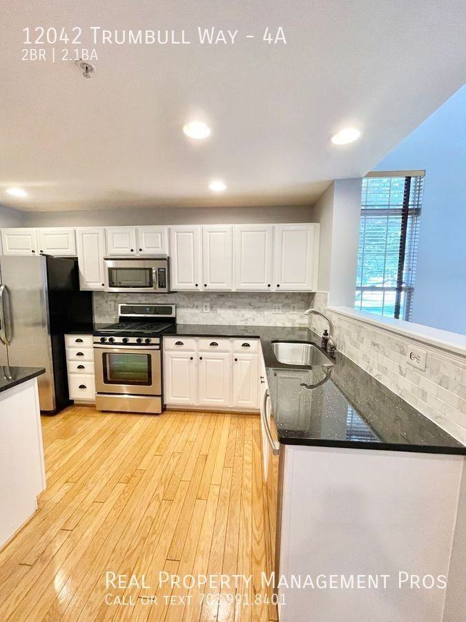 12042 Trumbull Way #4A - Photo 2 of 34