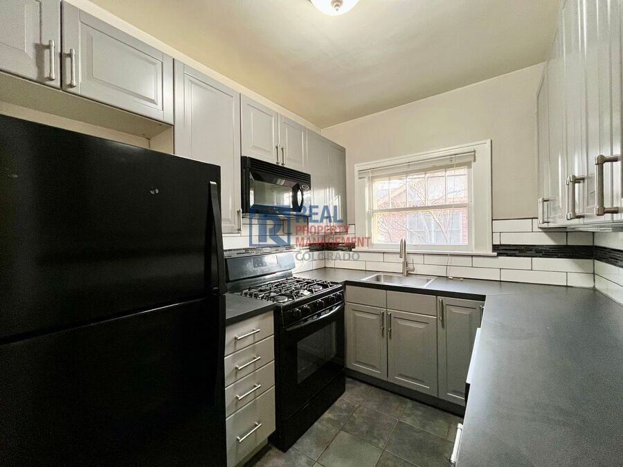 565 S Ogden St - Photo 5 of 18