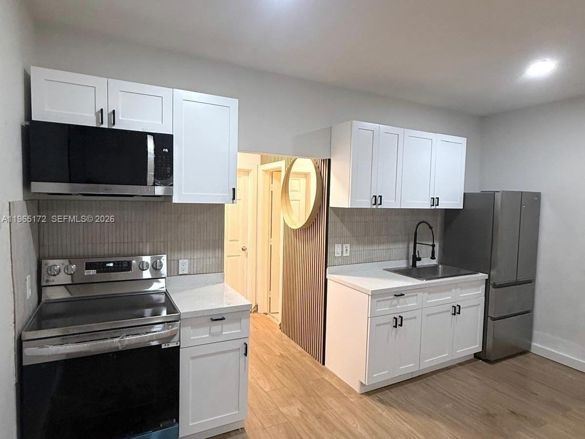 7734 Abbott Ave #101 - Photo 3 of 13