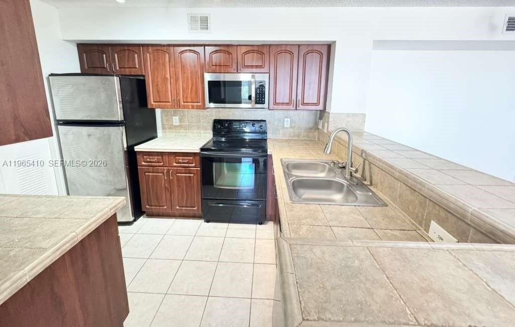 1715 Village Blvd #102 - Photo 2 of 27