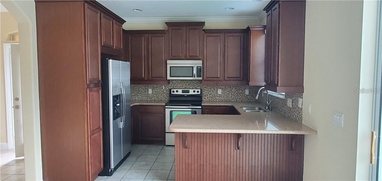 9403 Tawnyberry St - Photo 7 of 18