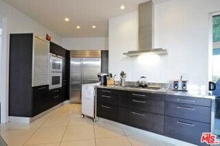 6767 Whitley Ter - Photo 4 of 8