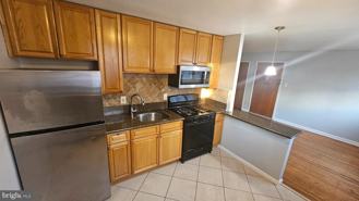 6007 Bingham St ## 9 - Photo 1 of 1