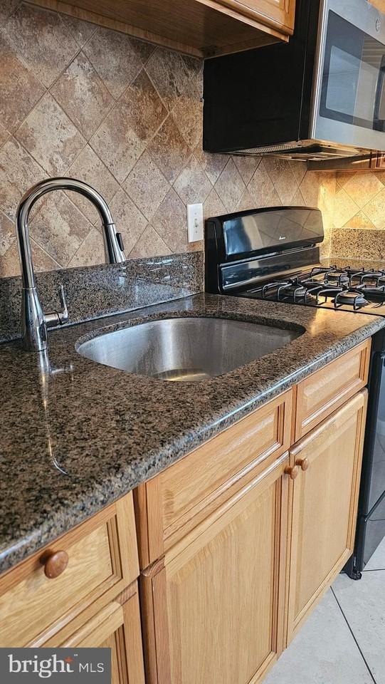 6007 Bingham St ## 9 - Photo 2 of 31