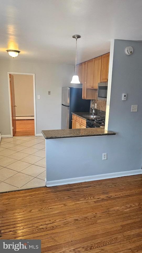 6007 Bingham St ## 9 - Photo 4 of 31