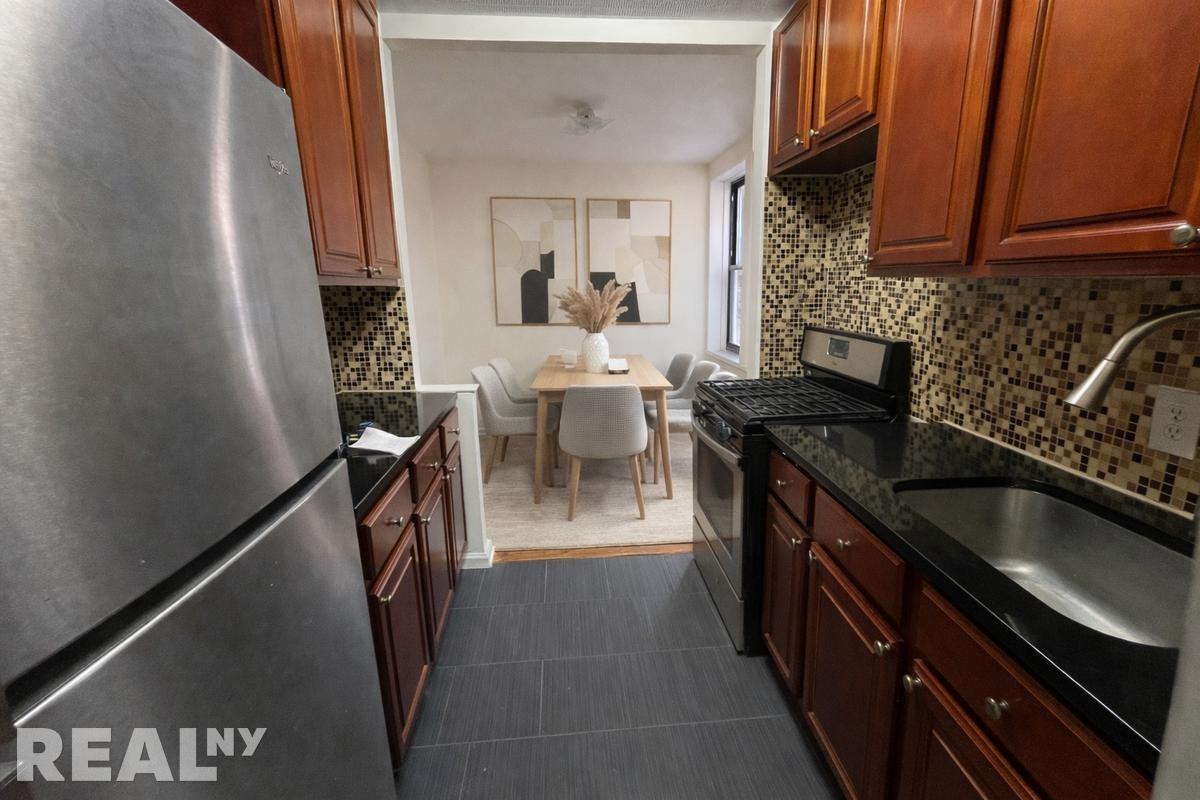 8710 37th Ave #203 - Photo 3 of 6