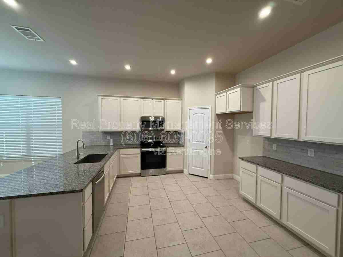 7115 90th St - Photo 3 of 10