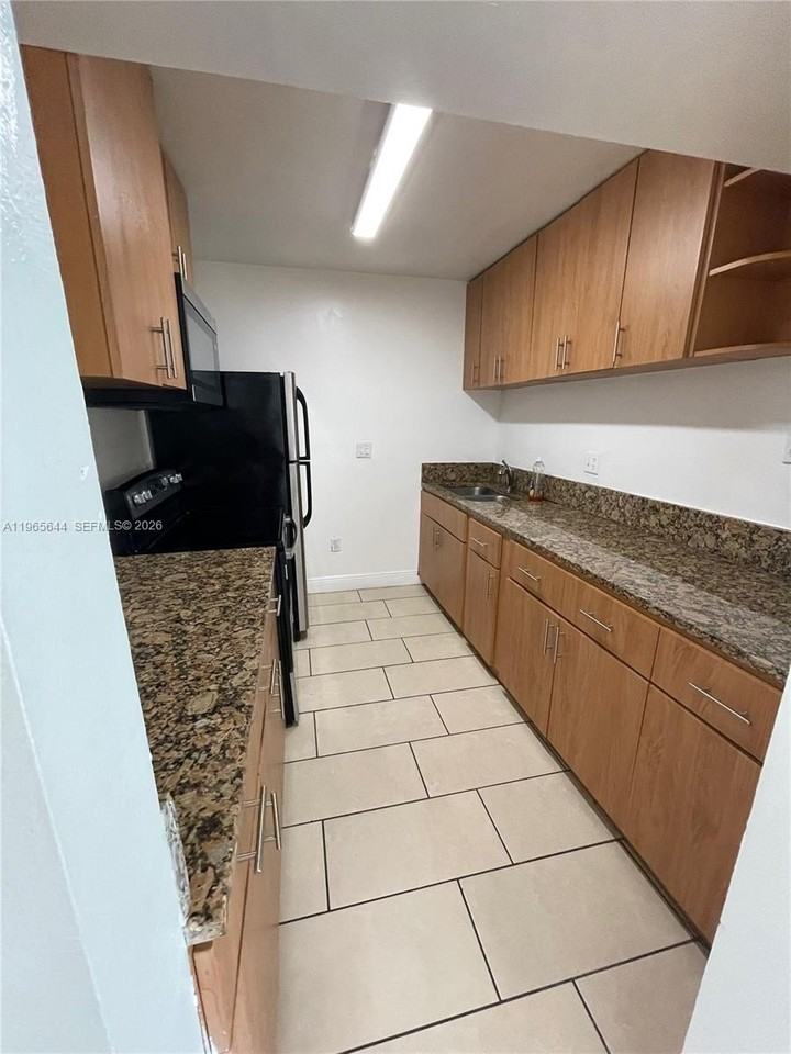 4721 Nw 7th St #101-12 - Photo 2 of 32