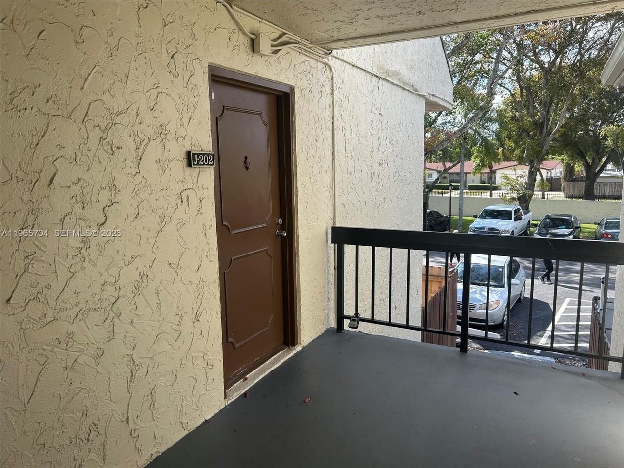 8311 Sw 142nd Ave #J202 - Photo 2 of 12