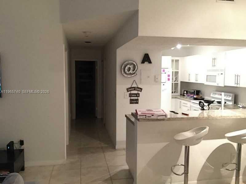 18850 Nw 57th Ave #308 - Photo 2 of 21