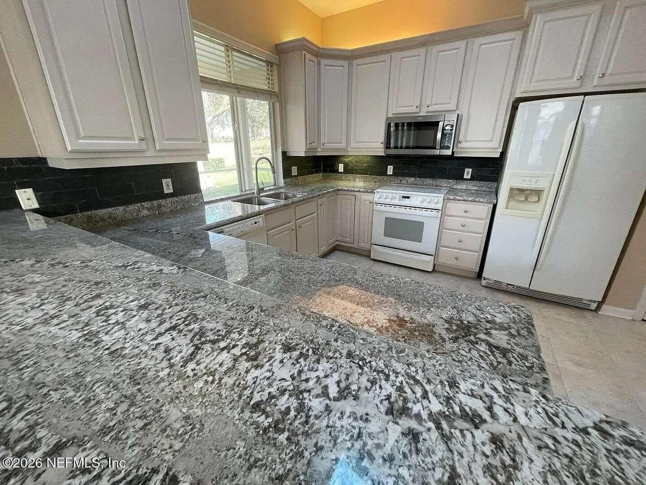 10576 Nw 32nd Rd - Photo 7 of 20