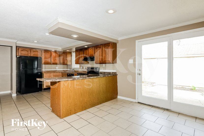 9404 Granville Pl - Photo 3 of 16