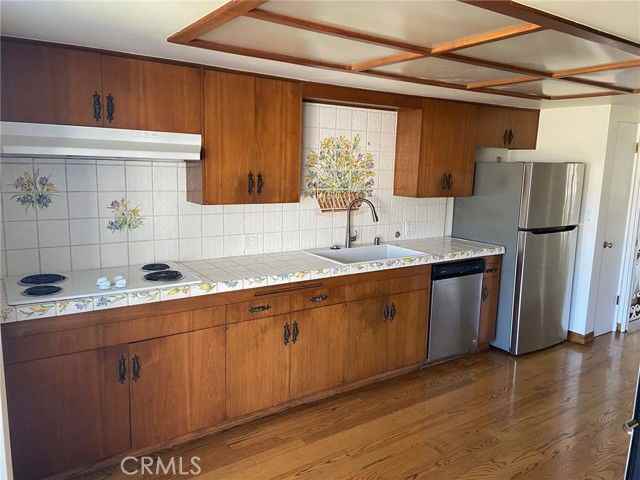 421 Avenue F - Photo 7 of 8