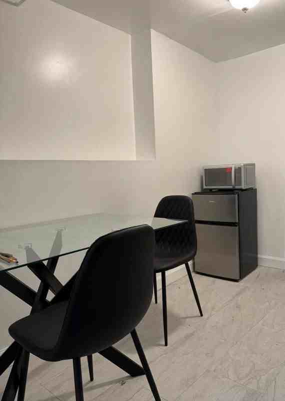 979 Utica Ave - Photo 3 of 5