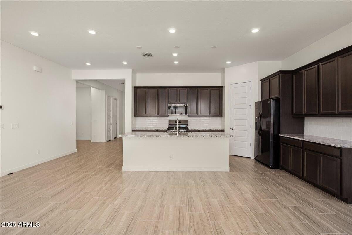 16786 W Cielo Grande Ave - Photo 7 of 38