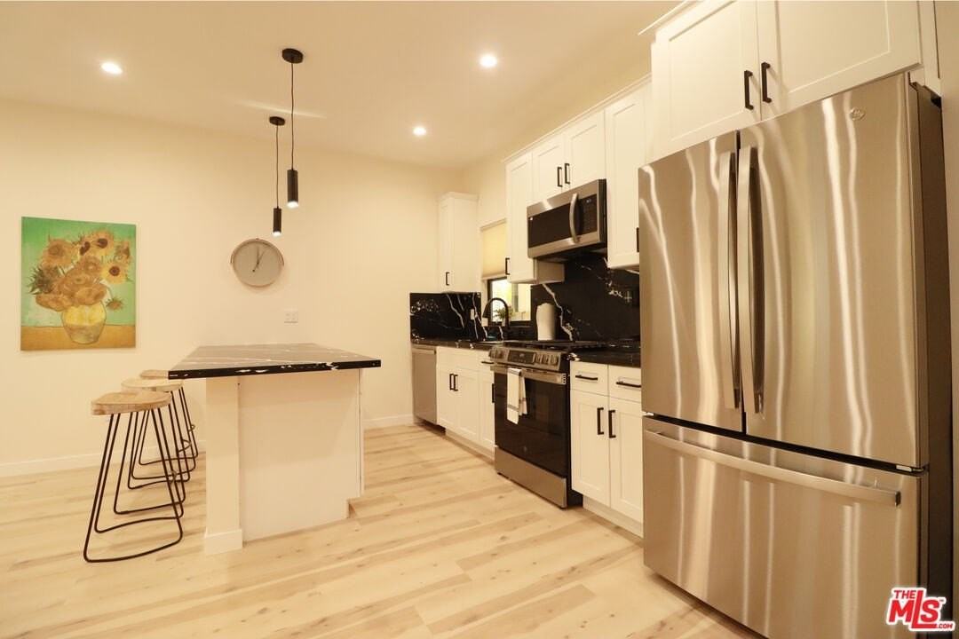 9040 Phyllis Ave Unit E #E - Photo 7 of 17