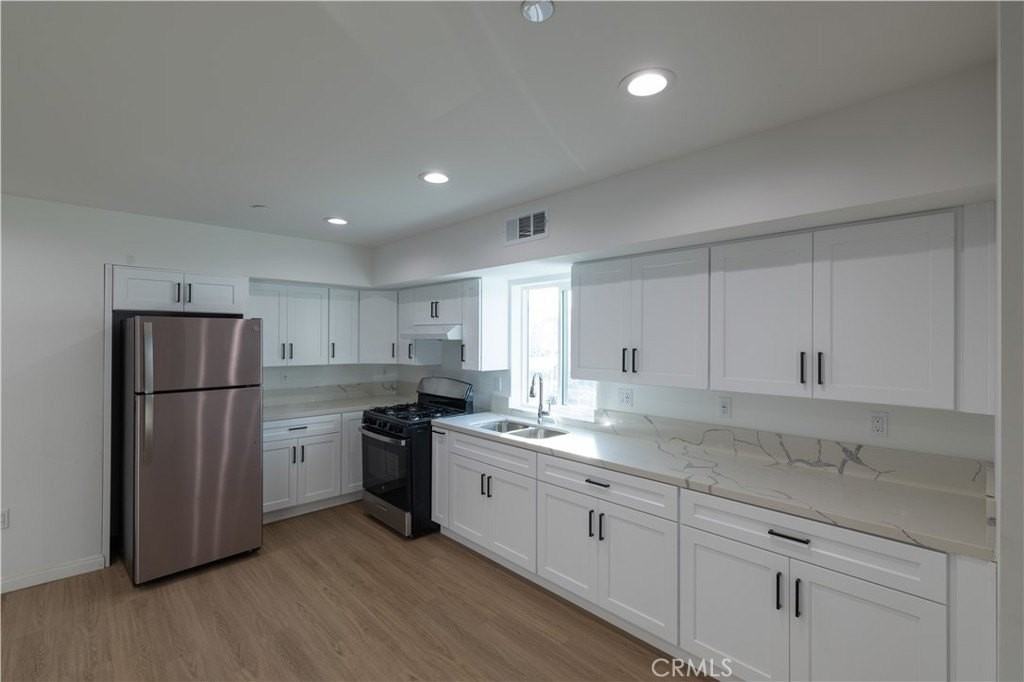 1202 E 3rd St - Photo 2 of 12