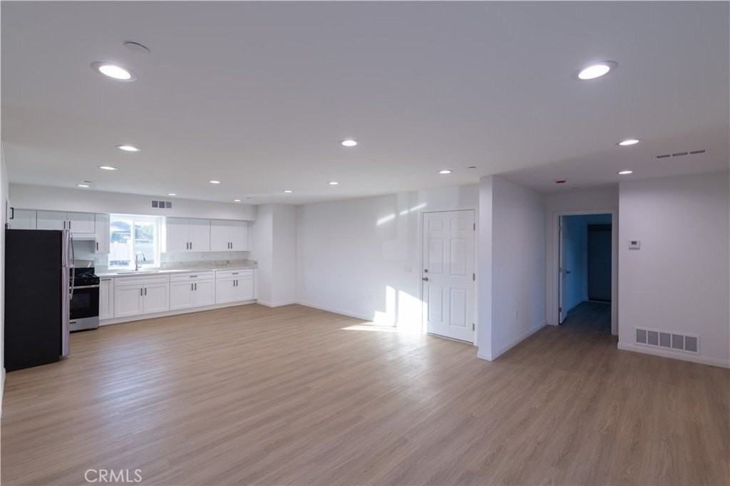 1202 E 3rd St - Photo 3 of 12