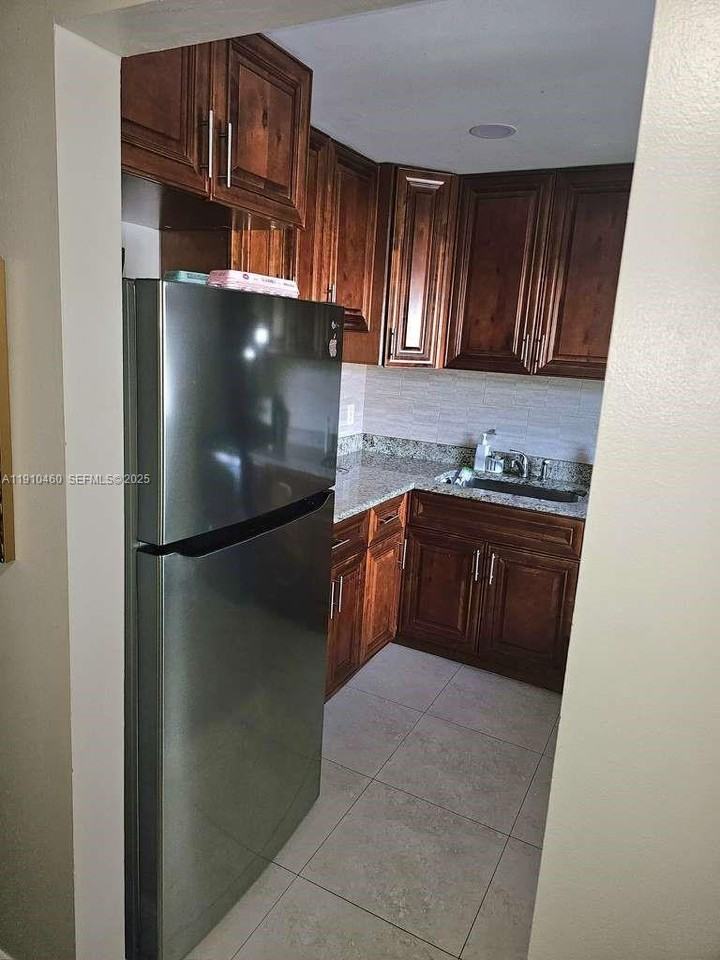 8301 Sands Point Boulevard - Photo 5 of 6