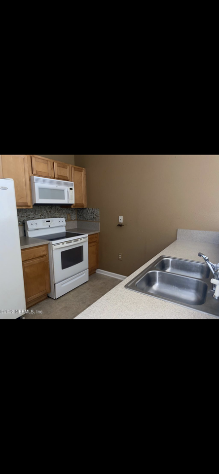 6075 Maggies Cir #103 - Photo 7 of 8