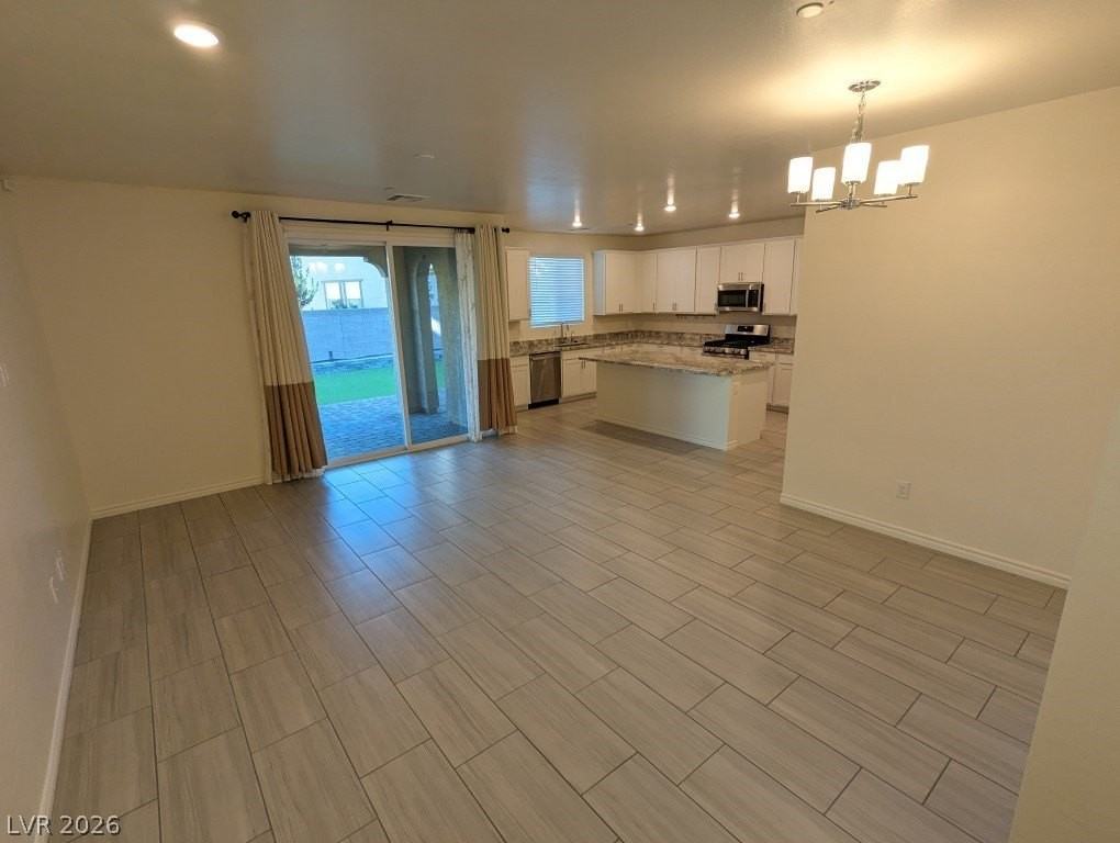 1310 Ossa St - Photo 4 of 37