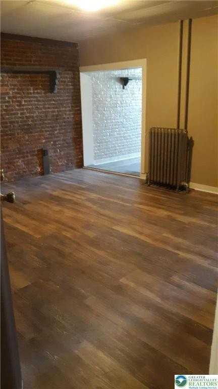 228 W 3rd St - Photo 3 of 5