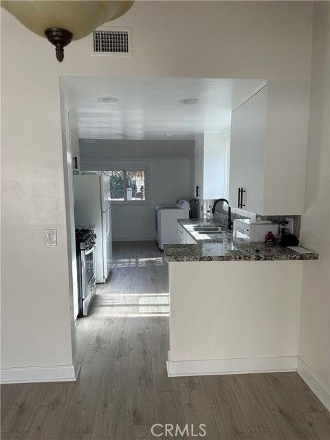 9511 Hayvenhurst Ave - Photo 3 of 8
