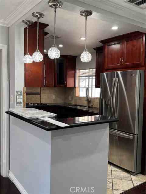 8739 Tyrone Ave - Photo 7 of 8