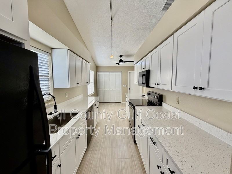 4935 82nd Pl E - Photo 4 of 15