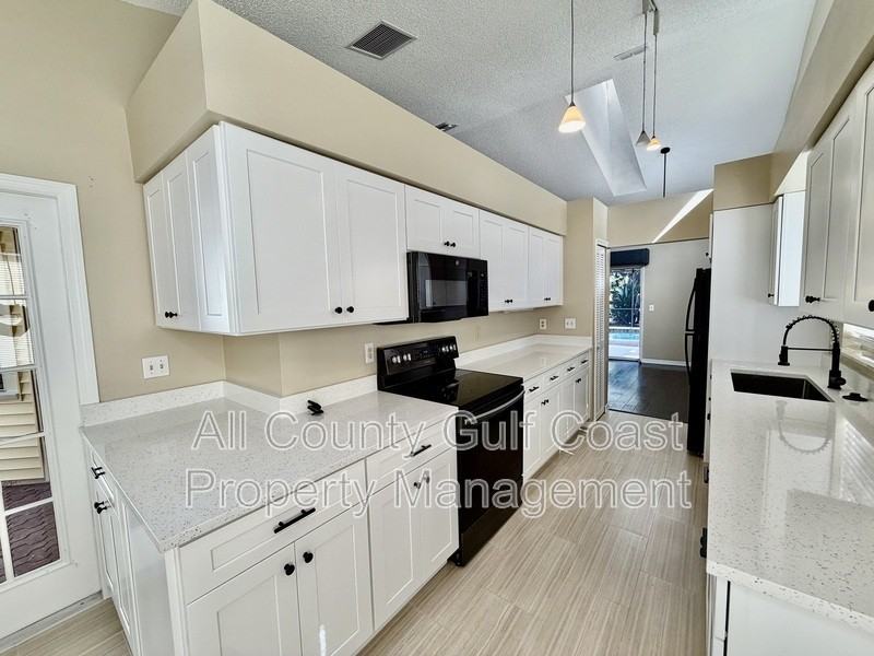 4935 82nd Pl E - Photo 5 of 15